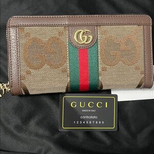 NIB Gucci Brown Leather Zippy Wallet with Gold GG Charm